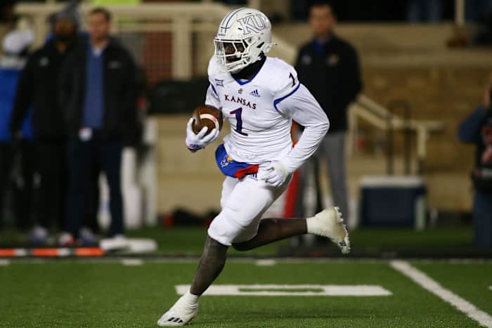 Nov 12, 2022; Lubbock, Texas, USA; Kansas Jayhawks punt returner Kenny Logan Jr. (1) returns a kick against the Texas Tech Red Raiders in the second half at Jones AT&T Stadium and Cody Campbell Field. Mandatory Credit: Michael C. Johnson-USA TODAY Sports